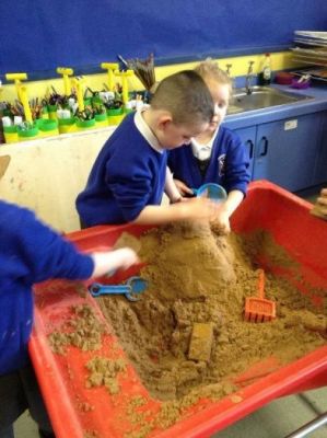 Burying the eggs in the sand. Great teamwork.